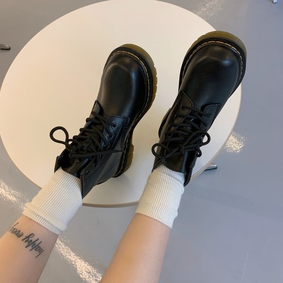 Black high top leather shoes
